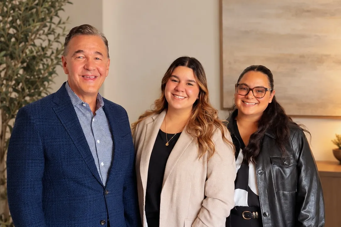 David Parsons, founder and president of Summit Link Logistics, with two members of the Summit Link team